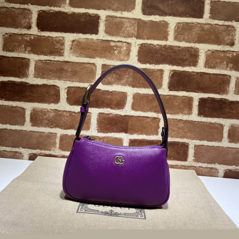 G*u*i top handle bags